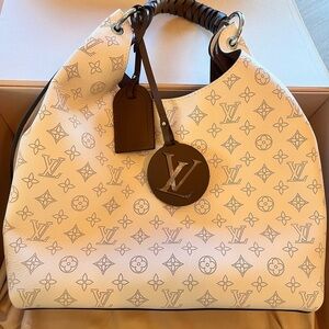 Louis Vuitton Mahini Cream bag. NWT